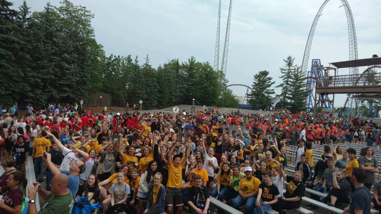 music at the park students excited after receiving strong scores.